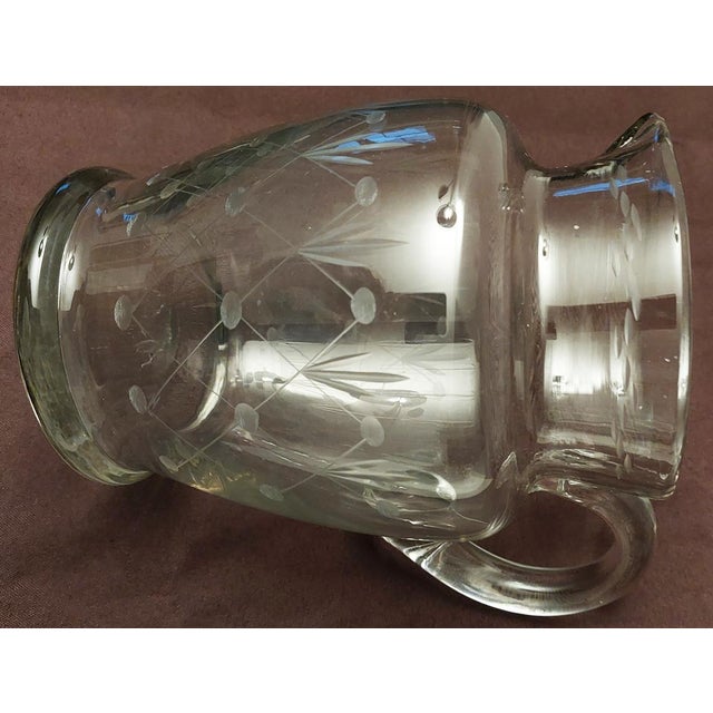 Antique pitcher or decanter from approximately 1930, made of crystal and cut glass, entirely handmade and shaped, in...