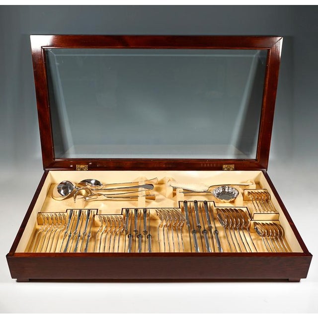 Elegant cutlery set made of solid silver for 6 people, consisting of 60 parts, in original display case. Date of...
