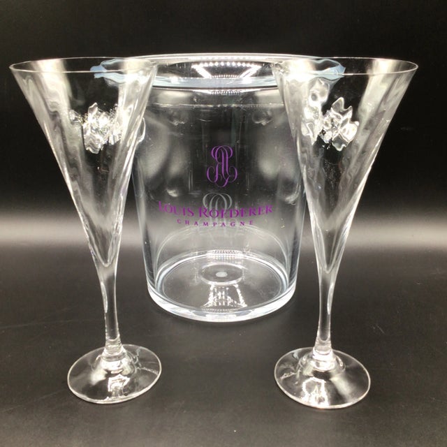 Lucite knob handle Louis Roederre champagne cooler and two Made in Sweden Orrefors champagne toasting flutes. The Orrefors...