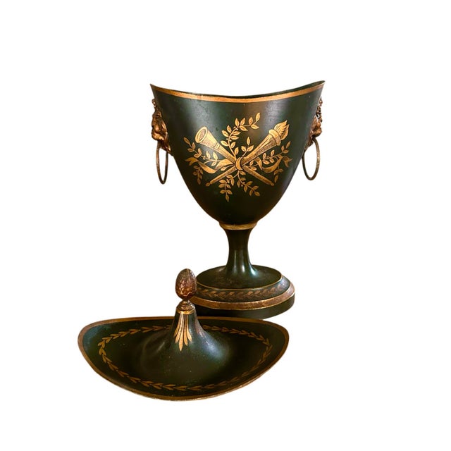 A gorgeous, antique chestnut urn. Features a lidded tole body, finished in the deepest, darkest shade of bottle green...