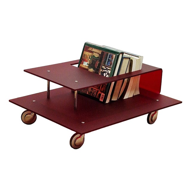 Italian Coffee Table in Burgundy Acrylic Glass and Chrome Wheels, 1990s For Sale