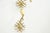 Elegant set of two sculptural wall sconces attributed to Jules Leleu, comprising a one-light sconce and a two-light...