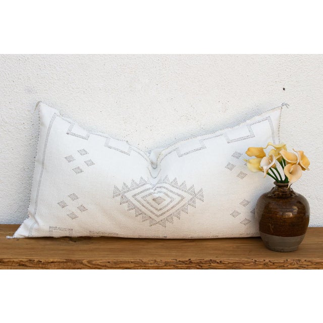 Woven from the resilient fibers of the Saharan aloe vera cactus — often called cactus silk or Sabra silk — this generously...