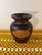 A beautifully hand turned mid century studio wood vase, sculpted from a single block of solid hardwood, likely walnut. The...