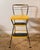 An original vintage Cosco Stylaire step stool chair in vibrant yellow vinyl with a polished chrome frame. A classic...