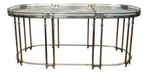 Neoclassical style coffee table in silver metal with antique mirror top