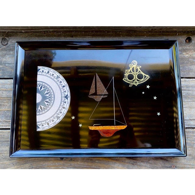 Inspired by the golden age of offshore sailing, this exceptional vintage Couroc of Monterey serving tray celebrates the...