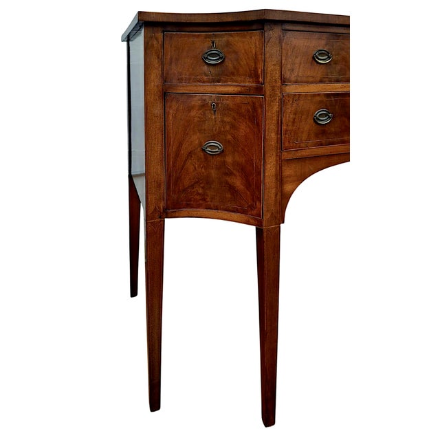On offer is a diminutive Federal-style mahogany sideboard. This is a highly functional, classic piece of American dining...