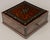 A 19th Century French Napoleon III marquetry box, hand-crafted of walnut and thuya burl wood veneers with ebonized trim....