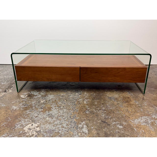 Design Plus Gallery presents a Shaman Coffee Table from Zoo Modern. Bent glass panels form a continuous frame around a...