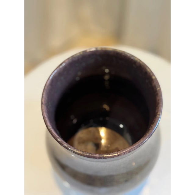 This exquisite Sarreguemines Crystalline Glaze Vase is a rare and captivating example of vintage French art. Showcasing a...