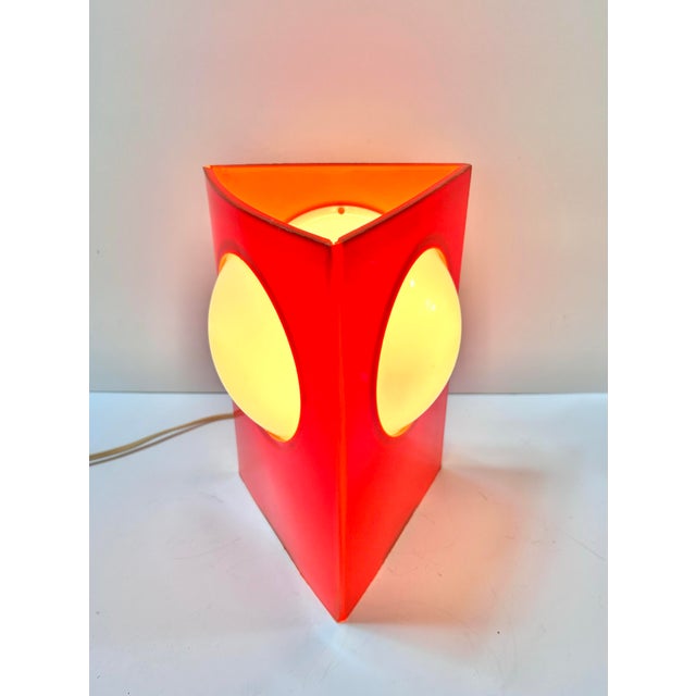 What a wonderful, American-made, mid century conversation starter. This three-sided space age piece still has the original...