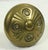 Four fold swirl design knob. Sold as a single individual knob. The manufacturer and exact date of creation are unknown....