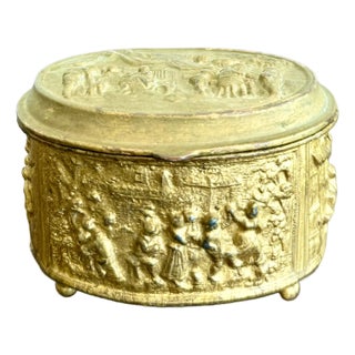 Vintage Embossed Metal Trinket Box With Festive Village Scene For Sale