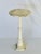 A round alabaster stand with column base. Retains original tag. Italian from the 50’s.