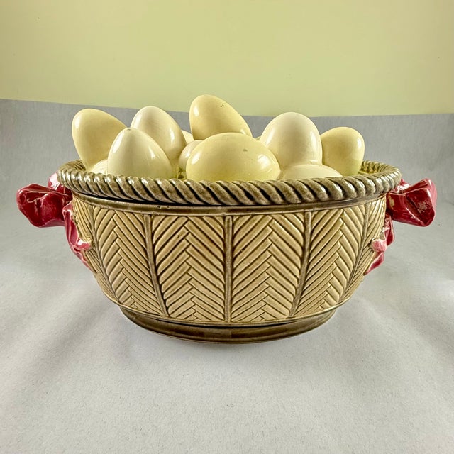 A scarce trompe l’oeil covered tureen from Choisy-le-Roi, France, circa 1880-1889. An unusual tureen formed as a woven...