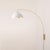 Weathered brass paired with a steel base defines the Luna Bella Wall Arc Lamp, an elegant mid-century modern lighting...