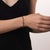 This beautiful vintage gemstone bangle is a vibrant 1970’s design, featuring 8 round brilliant cut diamonds weighing...