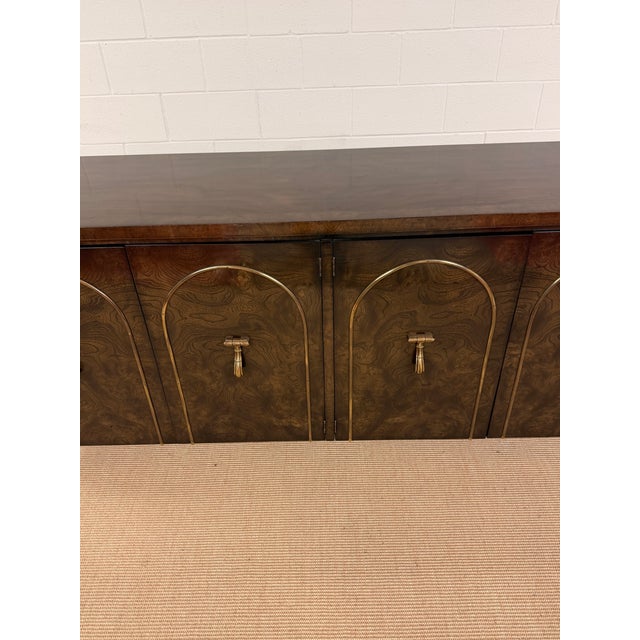Extremely Nice Burled Amboyna Floating Console/Credenza with Massive Brass Corner Supports and Inlaid Brass details. Very...