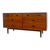 This mid-century modern set is crafted in rich walnut and includes an eight-drawer lowboy credenza alongside a matching...
