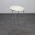 Barstool with saddle-shaped leather seat and minimal sled base in chromed steel. Designed for balance and simplicity, Mick...
