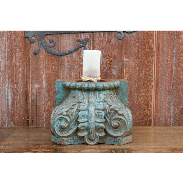 This truly unique decorative candle holder, hand chiseled by skilled craftsmen to feature meticulously carved acanthus...