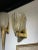 Fabulous pair of modern Murano glass and brass gold cup sconces. Beautiful flecks of gold throughout the glass along with...