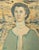 An oil on board painting by the artist Louis Hill. This piece features the portrait of a woman in a white and green dress...