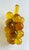 This striking mid-century modern grape cluster dates to the 1960s and is crafted from translucent golden-yellow lucite,...