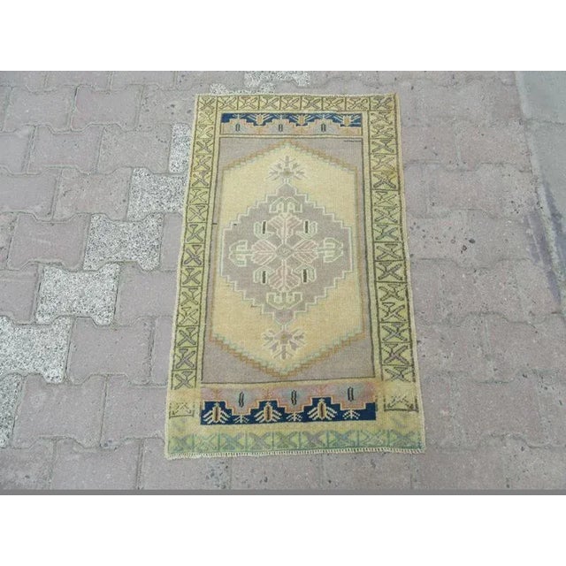 Handknotted Vintage rug from Oushak region of Turkey. Approximately 45-55 years old.In very good condition.