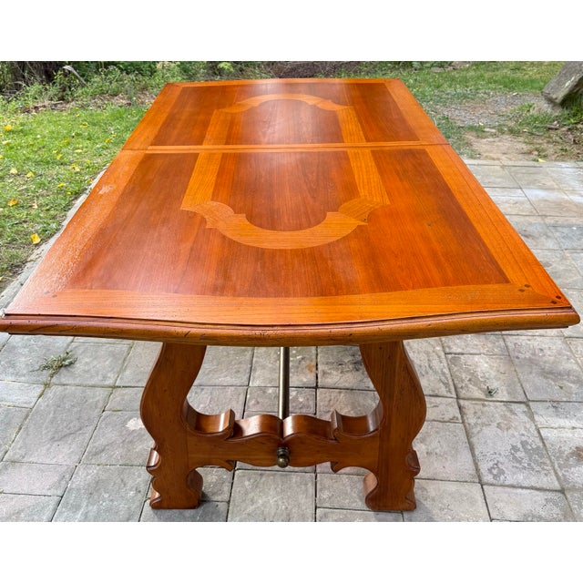 Gorgeous French heritage harvest extension dining table. This table embodies the charm and character of the French...