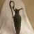 Victorian period 1800s cast metal ewer in a dark aged bronze color with a single handle. Cartouche, green man, cherub, and...