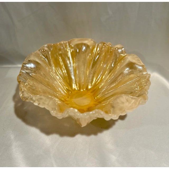 A vintage Murano large centerpiece bowl with a ruffled rim in an iridescent gold color with white swirl exterior...