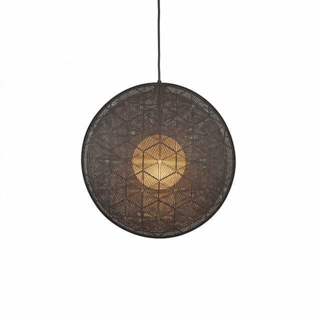 Handcrafted in the Philippines by Schema for Oggetti, the Hush Pendant Light showcases an exquisite balance of industrial...