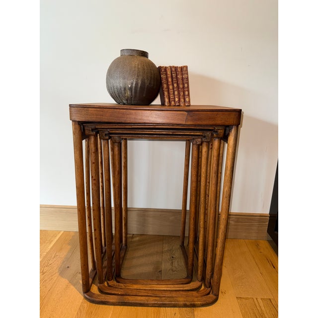 Set of four stacking tables - by Joseph and Jacob Hoffman. Original finish. The largest is 24” x 17 3/4” x 29” tall....