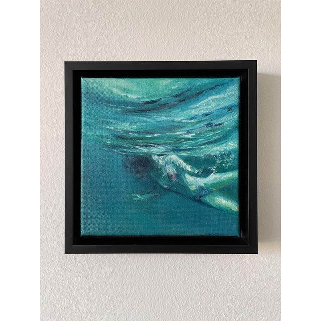 This oil on canvas artwork captures the fluid motion of a figure submerged beneath the water, enveloped by swirling waves...
