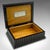 This is a vintage keepsake box. A Portuguese, rosewood and satinwood case with cricket interest, dating to the mid 20th...