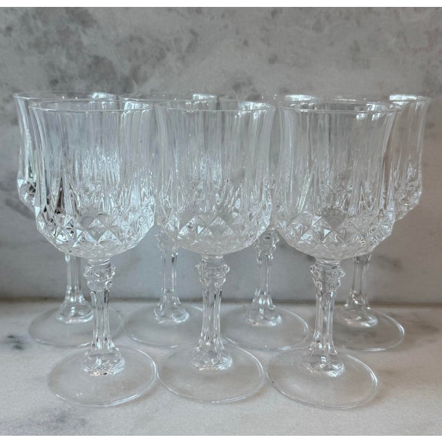 Set of 7 vintage French Cristal D'Arques Longchamp cyrstal wine glasses, launched in 1968 featuring a distinctive diamond-...