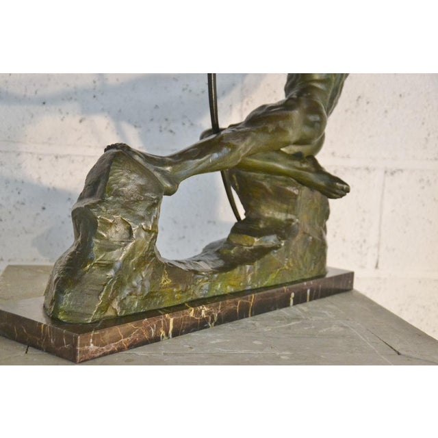 Victor DEMANET (1895-1964). Antique archer. Sculpture in green patinated bronze, signed on the terrace, base in black and...