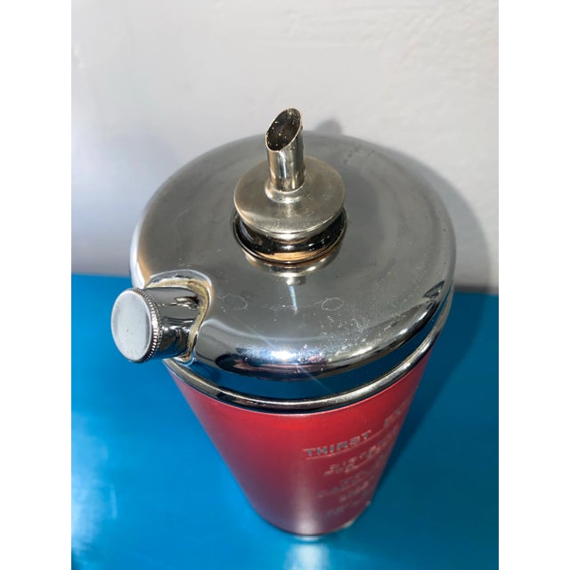 Thirst extinguisher... MCM cocktail shaker that plays "How Dry I Am". 4 inches wide and 11.75 inches tall.