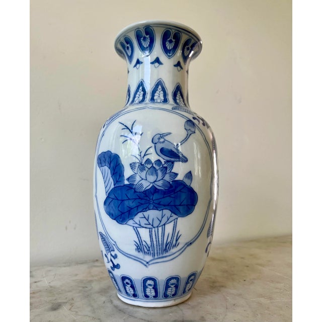 This classic blue and white vase will make a beautiful addition to your collection or a unique stand out accent in any room.