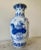 This classic blue and white vase will make a beautiful addition to your collection or a unique stand out accent in any room.