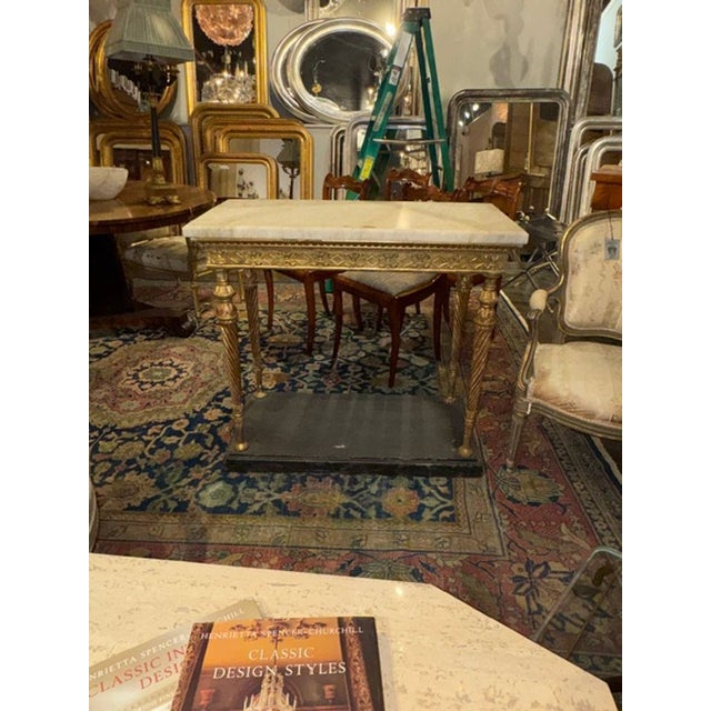This product is a fine 19th-century Swedish giltwood and marble top console. It is an elegant piece of furniture that...