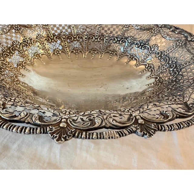 Beautiful sterling silver basket bowl by Crichton Brothers, featuring intricate hand-worked silver detailing. The basket...
