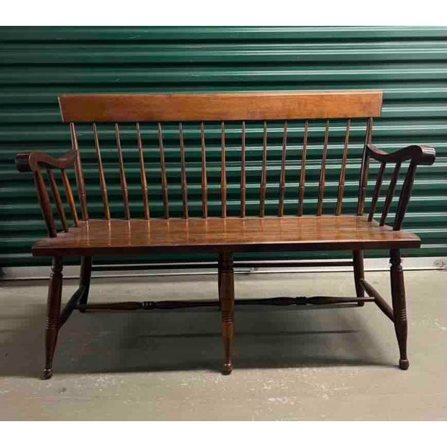 Mid-Century American Spindle-Back Deacon Bench in cherry-hardwood. Traditional style. Single-board bench. Seats 2-3.