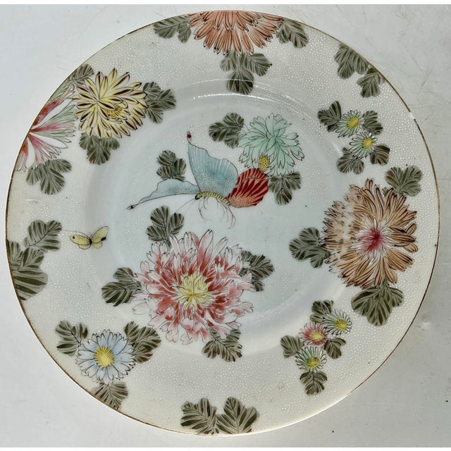 Pair of lovely antique Japanese porcelain dishes hand painted with butterflies and flowers.