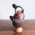 A classic piece of Peruvian artisanal clay vessel with jaguar motifs. Marked Cusco, Peru on the base — adds a beautiful...