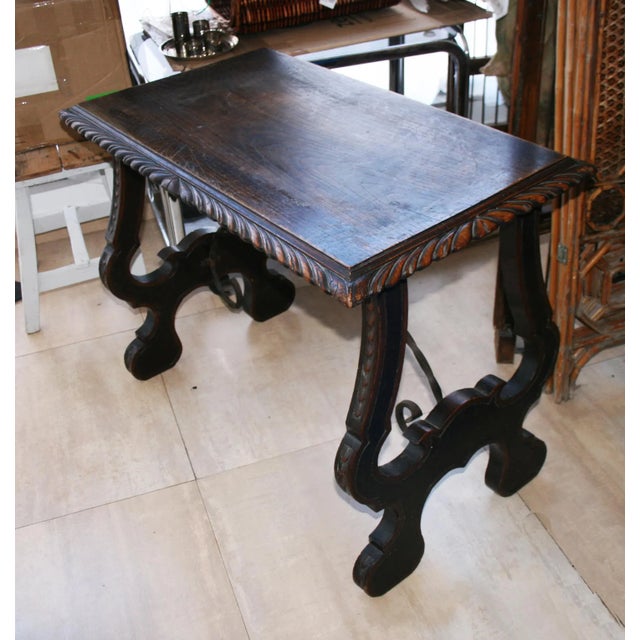 Spanish Table 18th Century of Chestnut Wood and Wrought Iron, With Legs in The Shape of a Lyre Top of a single chestnut...