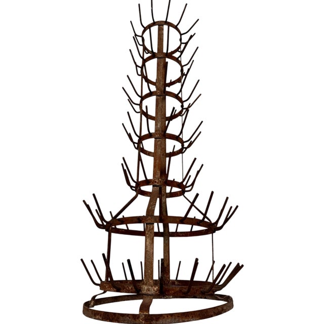 16”Diameter x 42”H This antique French bottle drying rack, standing over 40 inches, is a quintessential icon of industrial...