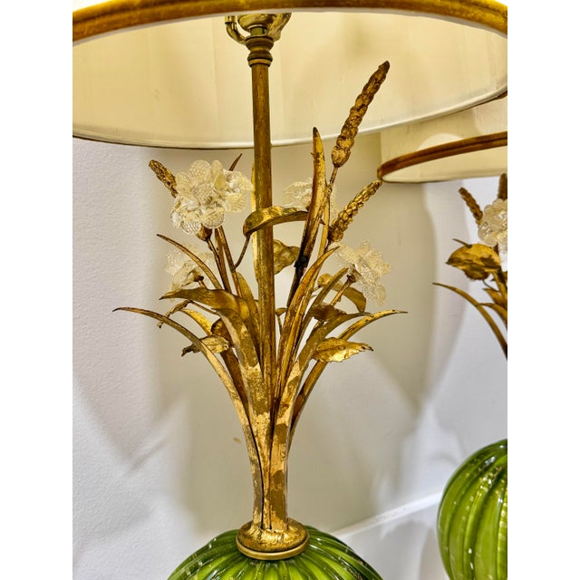 Elevate your interior with this exceptional pair of vintage 1950s Italian Murano glass table lamps. Reminiscent of the...